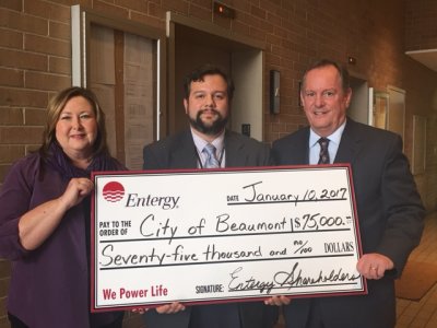 Pictured at the check presentation to the City of Beaumont are: Pamela Williams, Entergy Texas customer service representative; Carlos Aviles, City of Beaumont roadway designer and Vernon Pierce, Entergy Texas vice president of customer service.